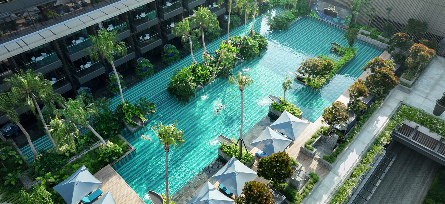 Pool around garden in front of pool access room at Padma Hotel Semarang
